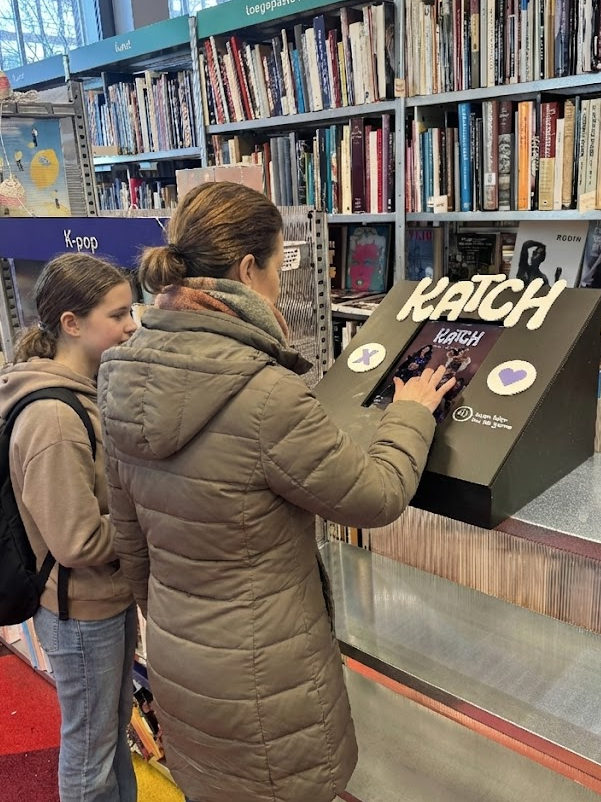 Visitor using the Katch kiosk in store