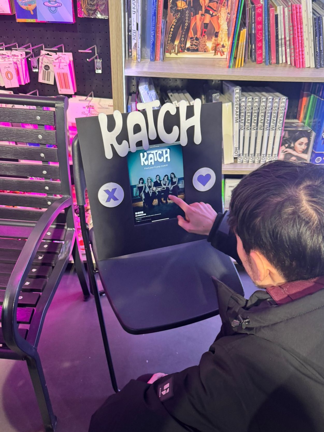 People interacting with the Katch installation